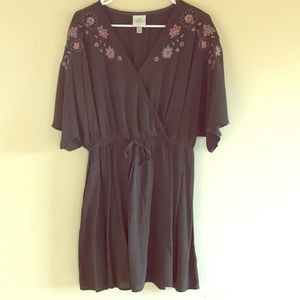 A loose midi dress with adjustable waste tie